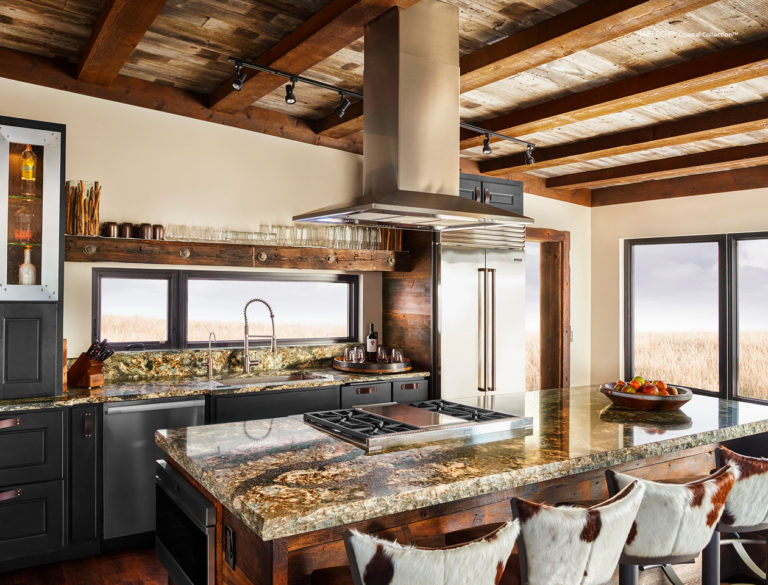 Harlech Cambria Quartz Kitchen Countertops with Brown Wood Cabinets, Stainless Steel, and Bar Stools