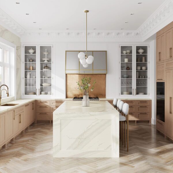 A close-up view of Cambria Inverness Swansea Quartz, showcasing its tonal white, marbled design with intricate debossed Inverness veins. Available in both high gloss and Cambria Matte finishes installed kitchen countertops